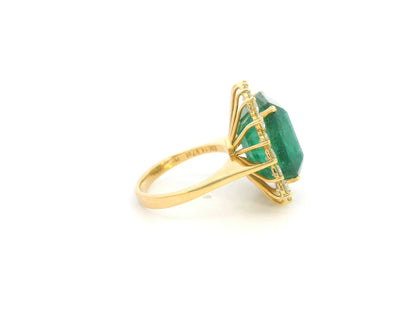 14.87 carat emerald and diamond halo statement ring in 18K yellow gold by Emirates Diamonds