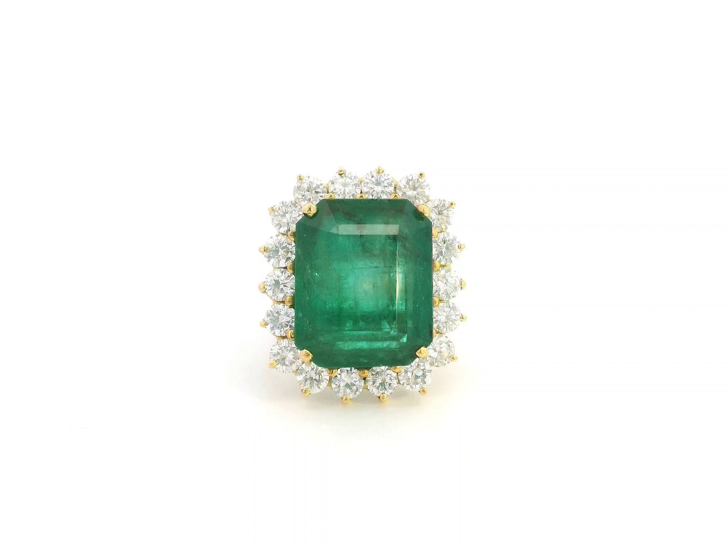 14.87 carat emerald and diamond halo statement ring in 18K yellow gold by Emirates Diamonds