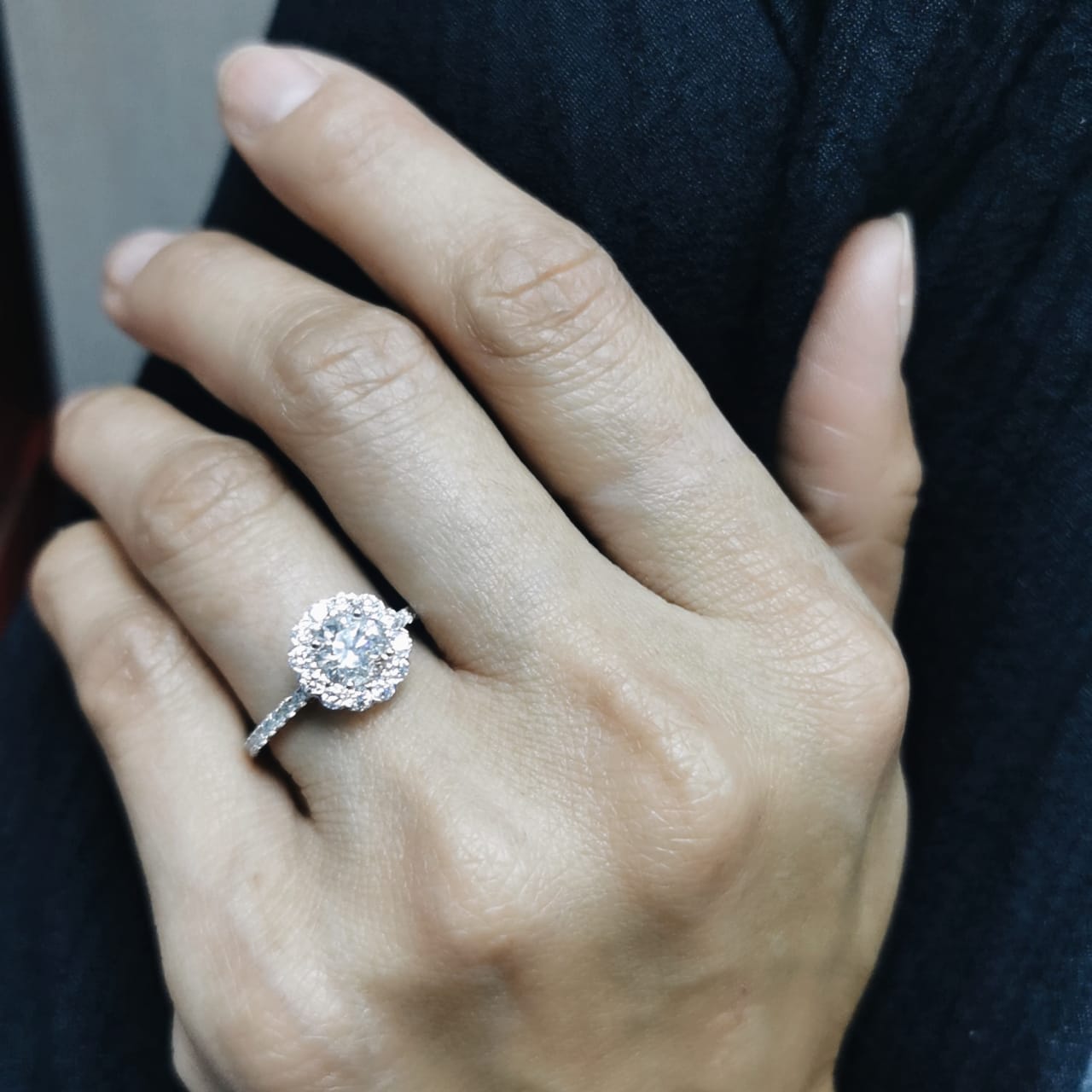 18K gold floral halo diamond ring with 1.00 carat center and 0.89 carat accent diamonds, vintage-inspired engagement design


