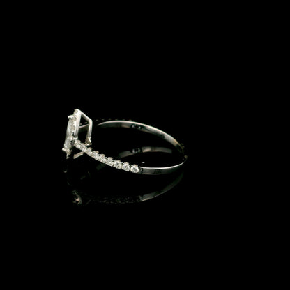 18K white gold marquise diamond halo engagement ring with diamond band featuring a 0.29 carat natural marquise cut centre diamond.
