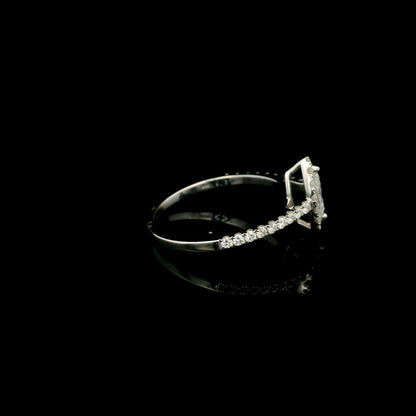 18K white gold marquise diamond halo engagement ring with diamond band featuring a 0.29 carat natural marquise cut centre diamond.