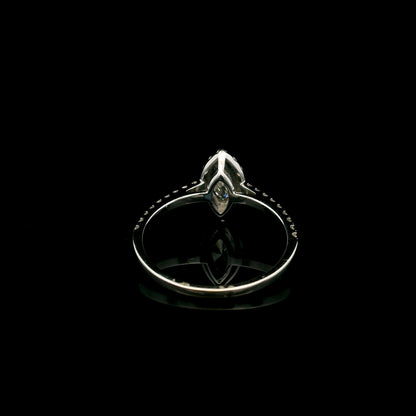 18K white gold marquise diamond halo engagement ring with diamond band featuring a 0.29 carat natural marquise cut centre diamond.
