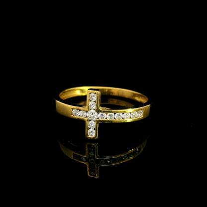 Diamond cross ring in 18K yellow gold featuring round brilliant diamonds set across a polished gold band in a distinctive cross design.