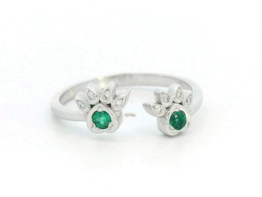 18K gold open band ring with emerald and diamond paw motifs