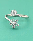 Bypass Design Flower Ring With Diamond In 18k White Gold.