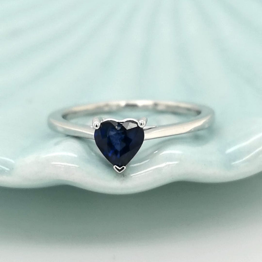 Exquisite Heart Shape Blue Sapphire Ring, Designed In 18k White Gold. A Luxurious And Unique Piece Of Jewelry, Perfect For Adding A Chic Touch Of Style And Elegance. Its Striking Blue Sapphire Can Be Worn As Is For A Subtle Yet Glamorous Look, Or Layered With Other Favorite Pieces For A Pop Of Vibrant Color. Indulge Yourself Today!