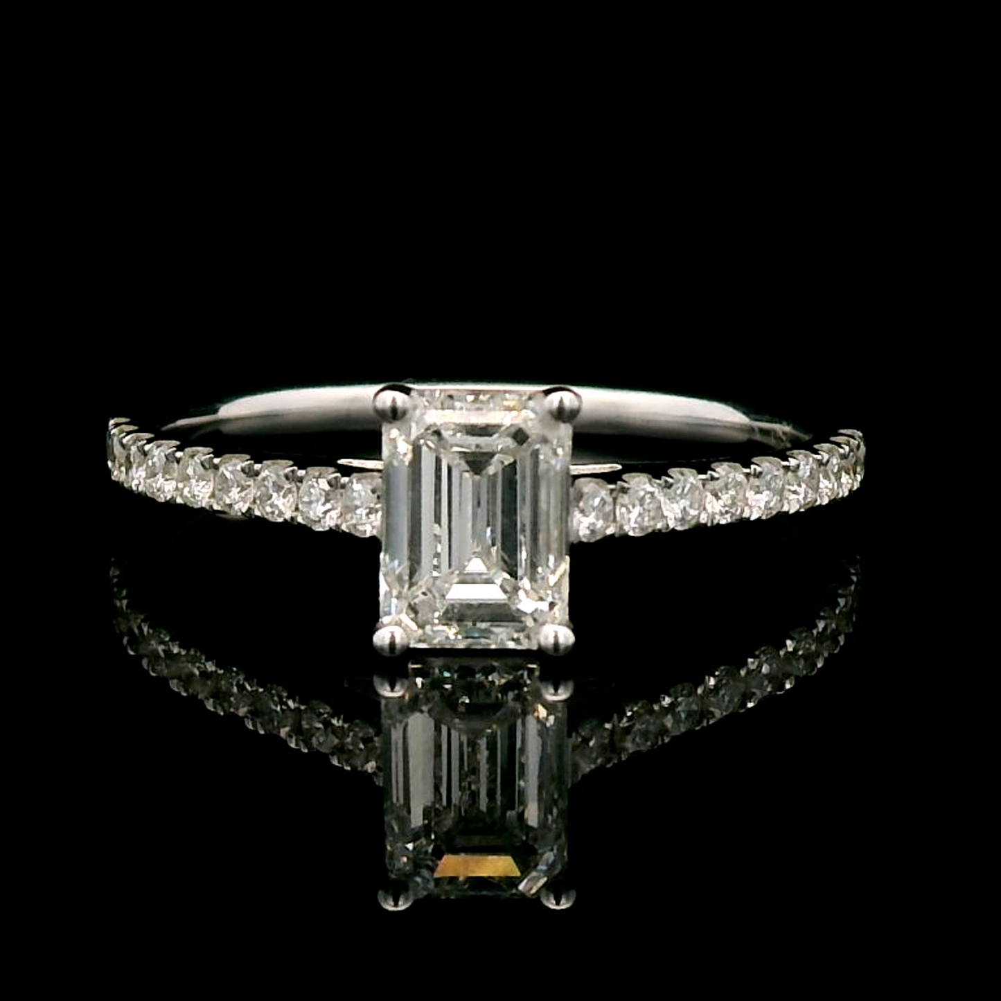 Solitaire Emerald-Cut Diamond Ring with Sparkling Diamond Encrusted  Band in 18k Gold.