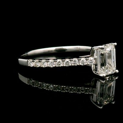 Solitaire Emerald-Cut Diamond Ring with Sparkling Diamond Encrusted  Band in 18k Gold.