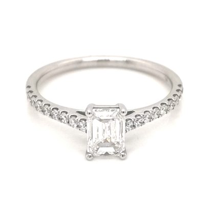 Solitaire Emerald-Cut Diamond Ring with Sparkling Diamond Encrusted  Band in 18k Gold.