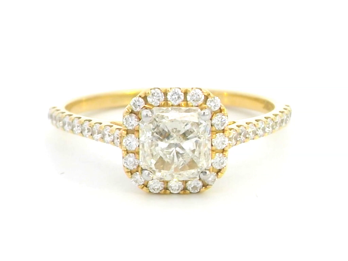 1.01 Carat Radiant Cut Diamond Halo Engagement Ring in 18k Yellow Gold.