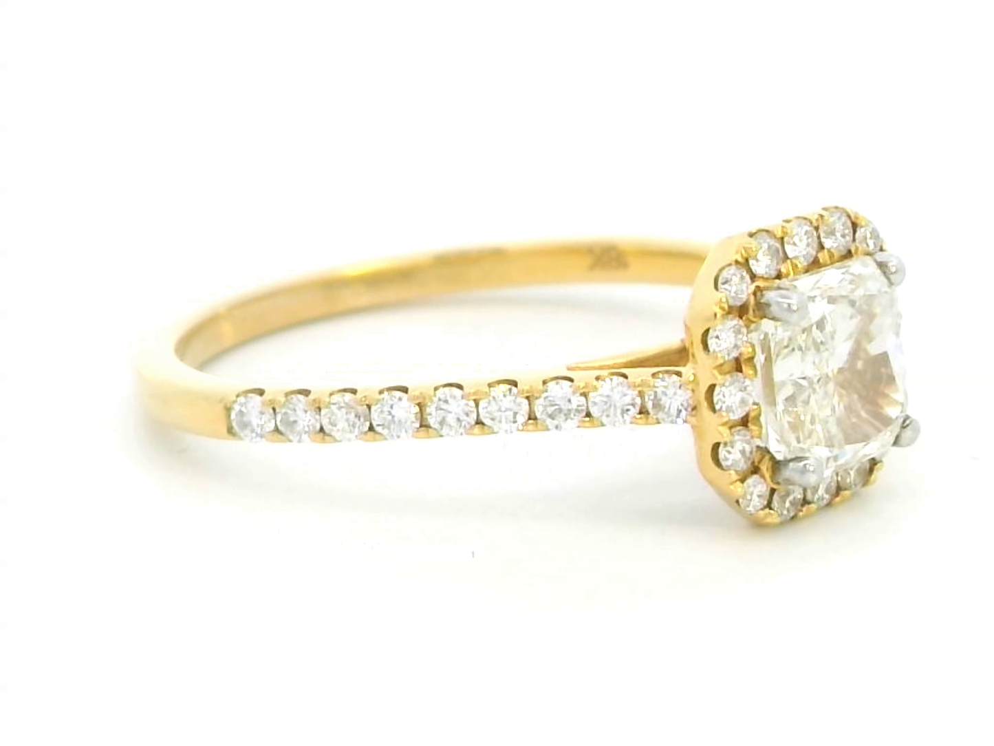 1.01 Carat Radiant Cut Diamond Halo Engagement Ring in 18k Yellow Gold.