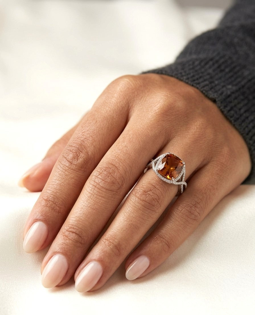 Cushion cut citrine diamond halo ring with sculptural split shank in 18K white gold
