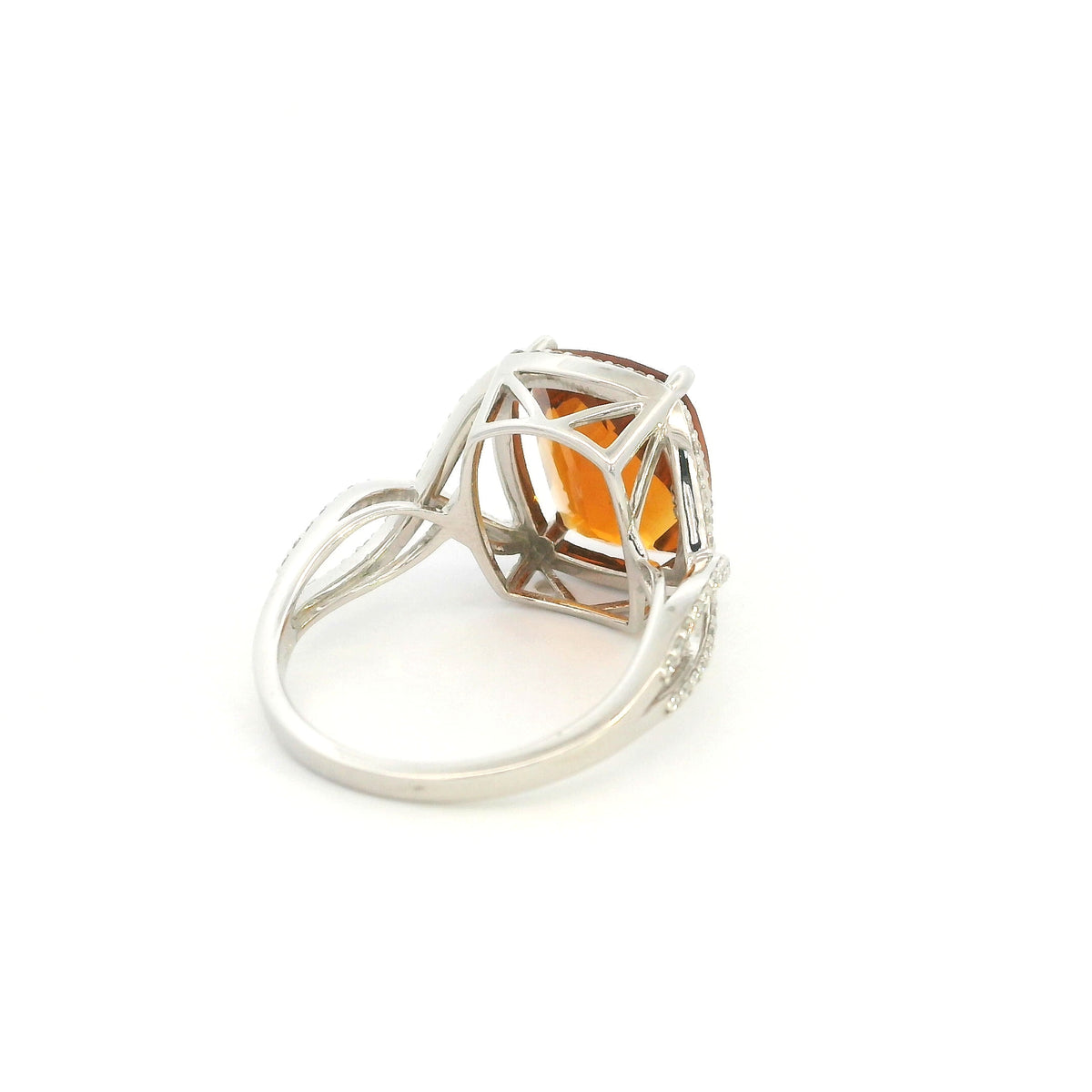 Cushion cut citrine diamond halo ring with sculptural split shank in 18K white gold