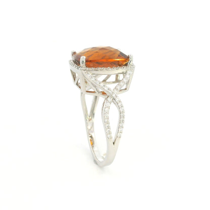 Cushion cut citrine diamond halo ring with sculptural split shank in 18K white gold