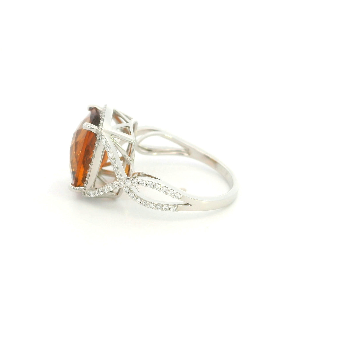 Cushion cut citrine diamond halo ring with sculptural split shank in 18K white gold