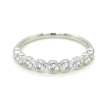 Bezel Set Half Eternity Diamond Ring In 18k White Gold.