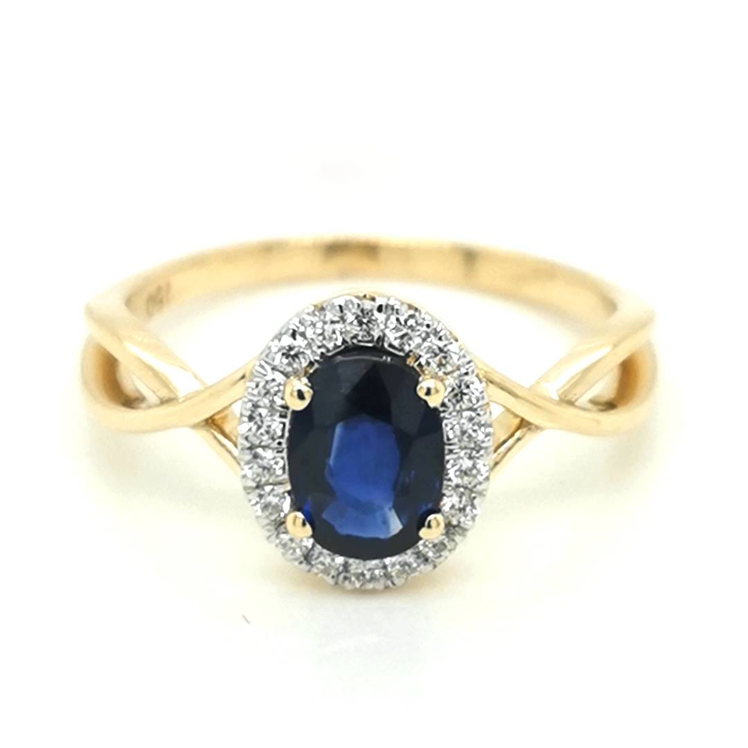 Sapphire And Diamond Ring In 18k Yellow Gold.