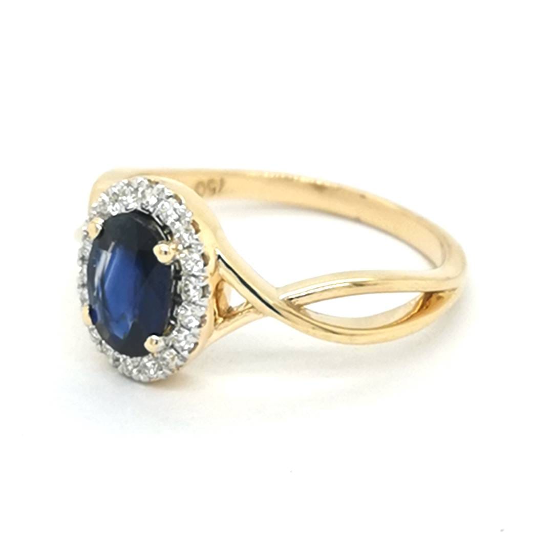 Sapphire And Diamond Ring In 18k Yellow Gold.