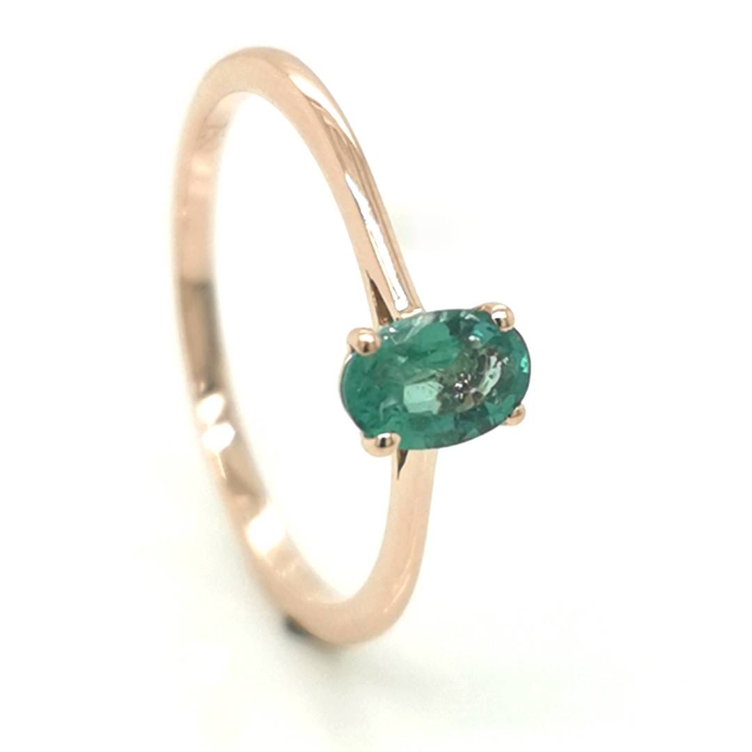 Solitaire Emerald Ring In 18k Rose Gold.