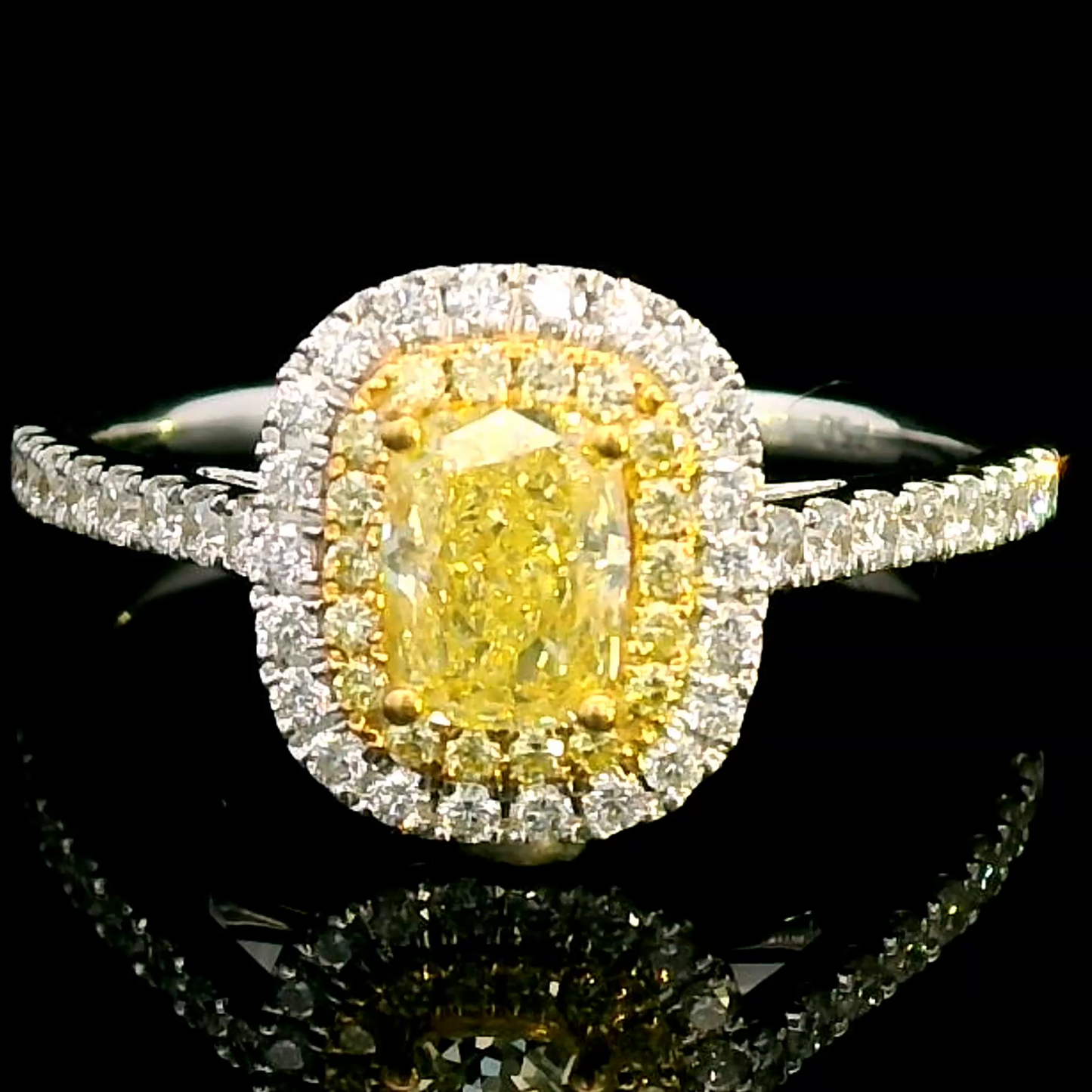 Exquisite Fancy Yellow Diamond Halo Ring in 18k Gold.