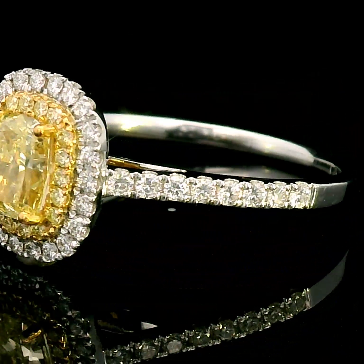 Exquisite Fancy Yellow Diamond Halo Ring in 18k Gold.