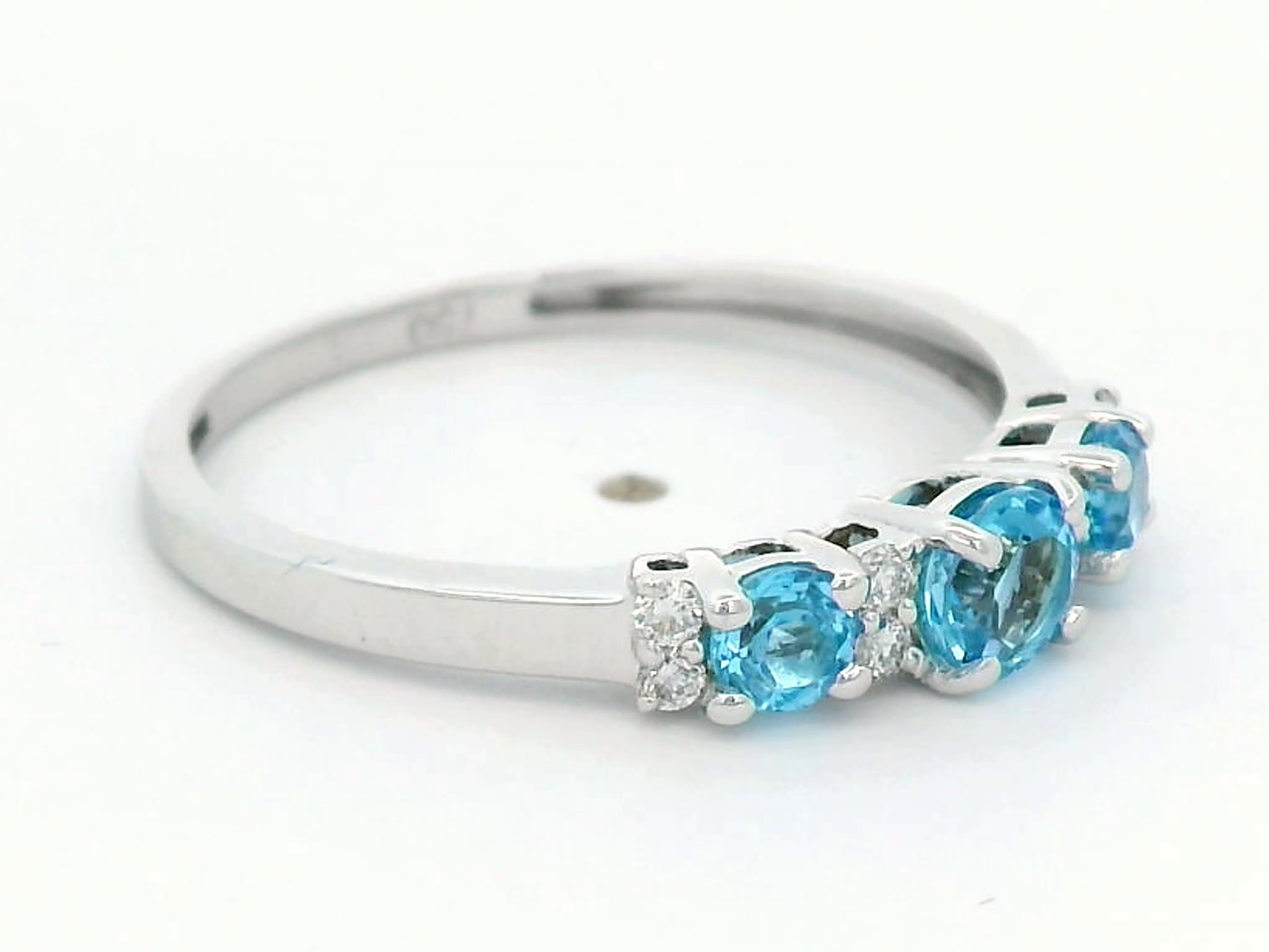 18k White Gold Blue Topaz and Diamond Ring.