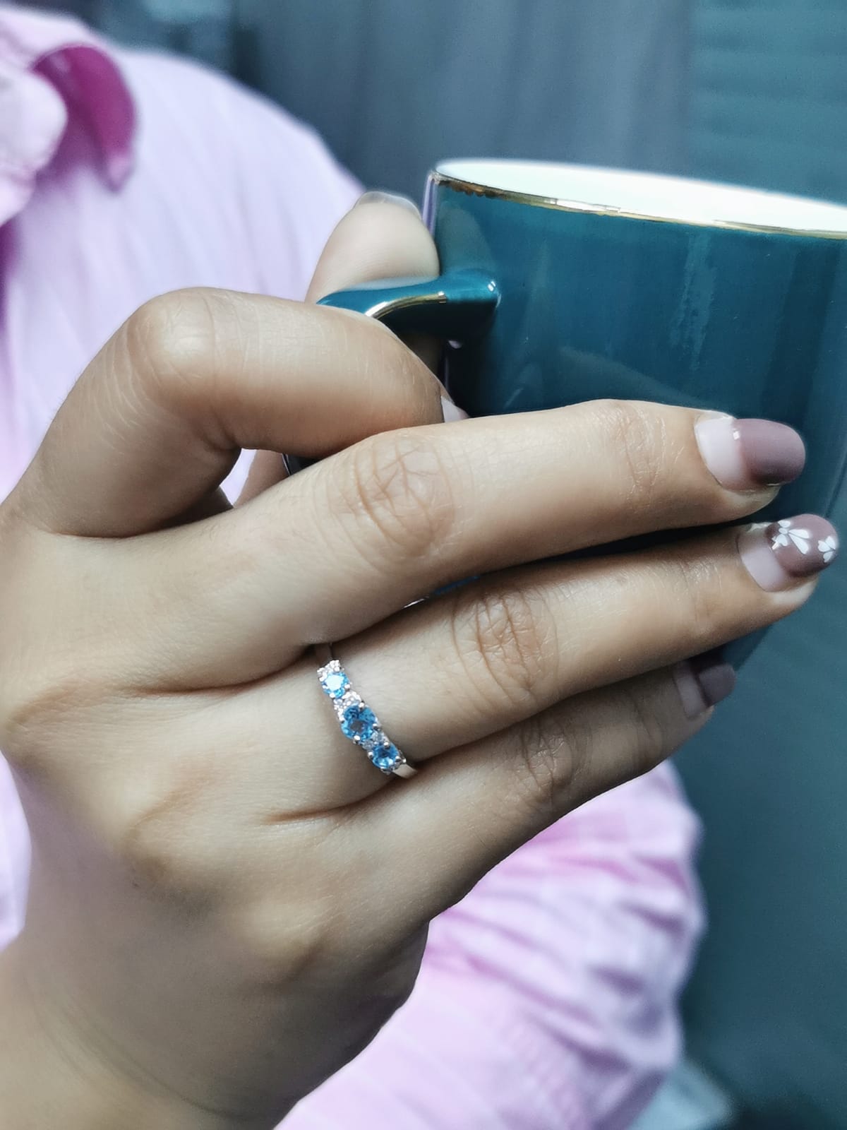 18k White Gold Blue Topaz and Diamond Ring.