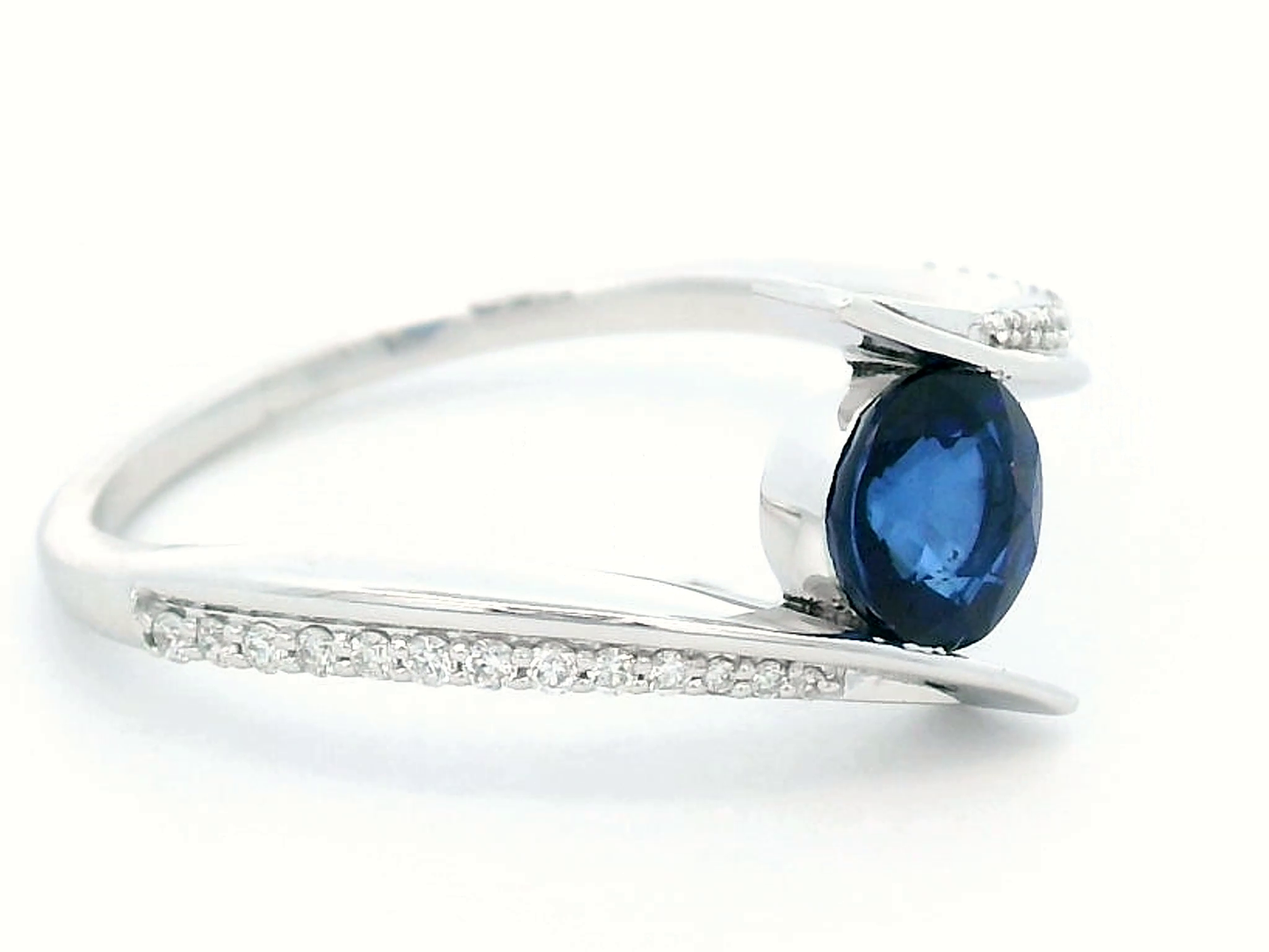 18K Gold Bypass Design Ring with 0.82 Carat Sapphire & Diamond Accents