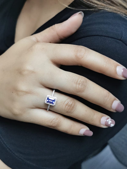 1.28ct Emerald Cut Tanzanite Ring with Diamond Halo in 18K Gold