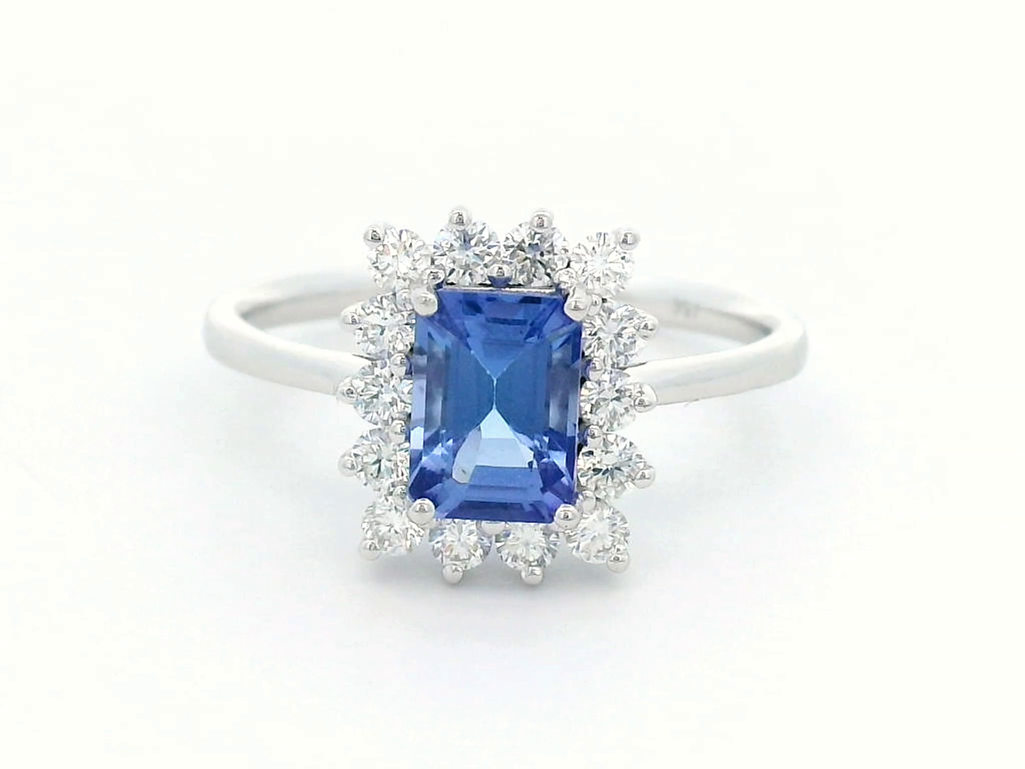 1.23 Carat Emerald-Cut Tanzanite and Diamond Halo Ring in 18K White Gold