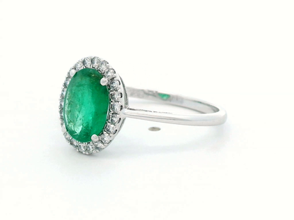 Elegant Oval Emerald and Diamond Halo Ring in 18K White Gold