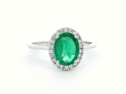 Elegant Oval Emerald and Diamond Halo Ring in 18K White Gold