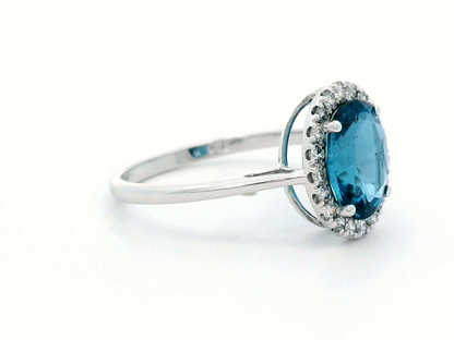 2.22 Carat London Blue Topaz Ring with Diamond Halo in 18K White Gold