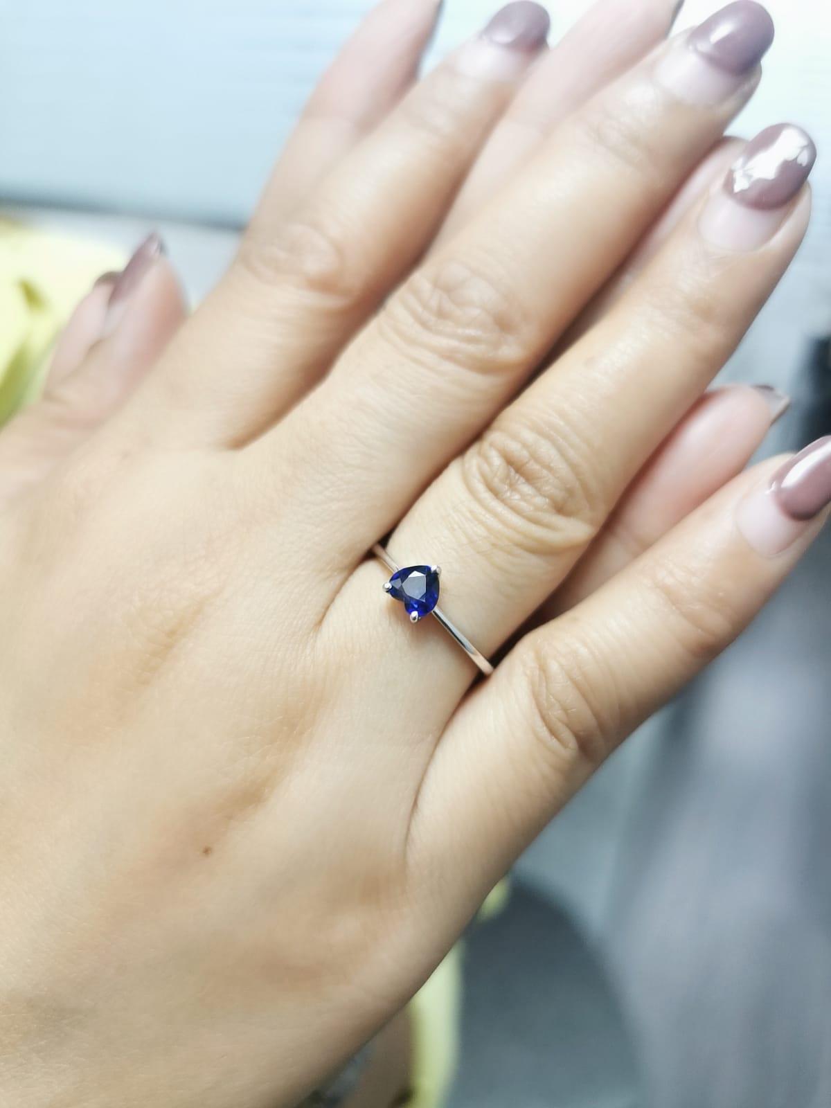 18K white gold ring featuring a 0.68 carat heart-shaped blue sapphire in a solitaire setting – Emirates Diamonds