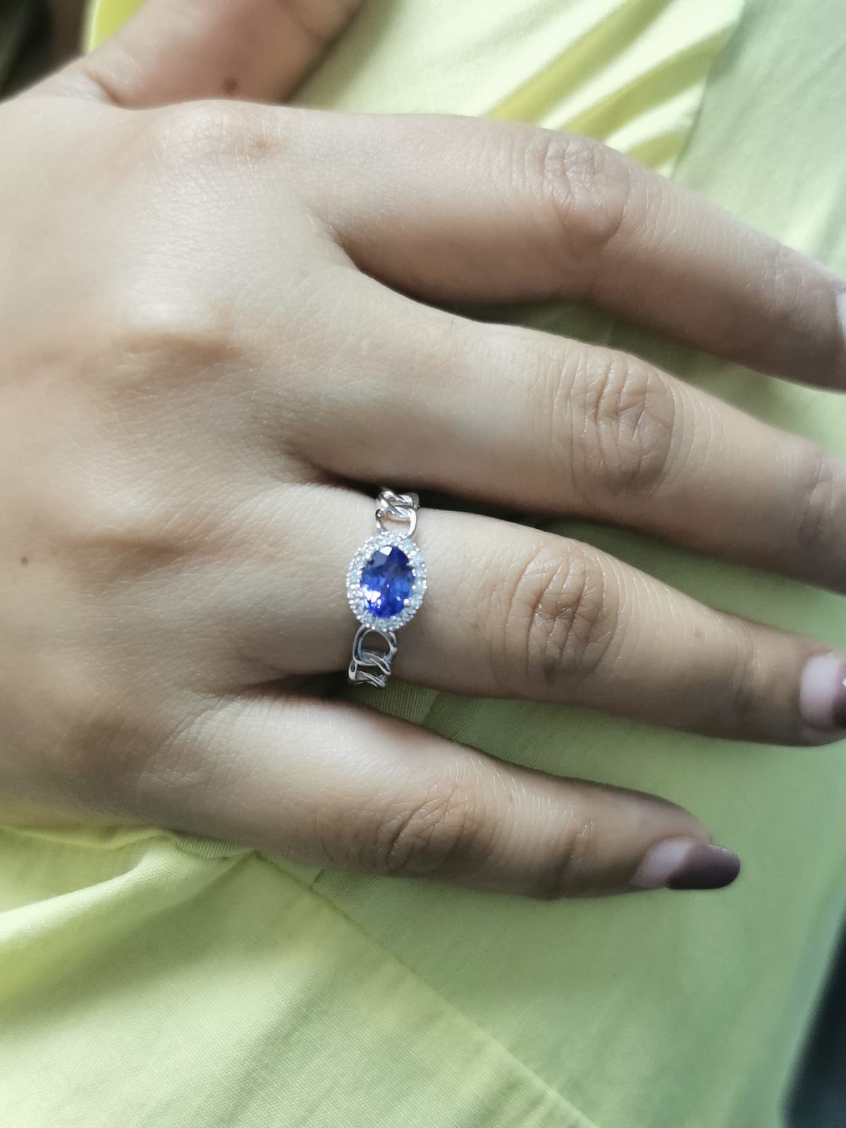 18K White Gold Oval Tanzanite and Diamond Halo Ring