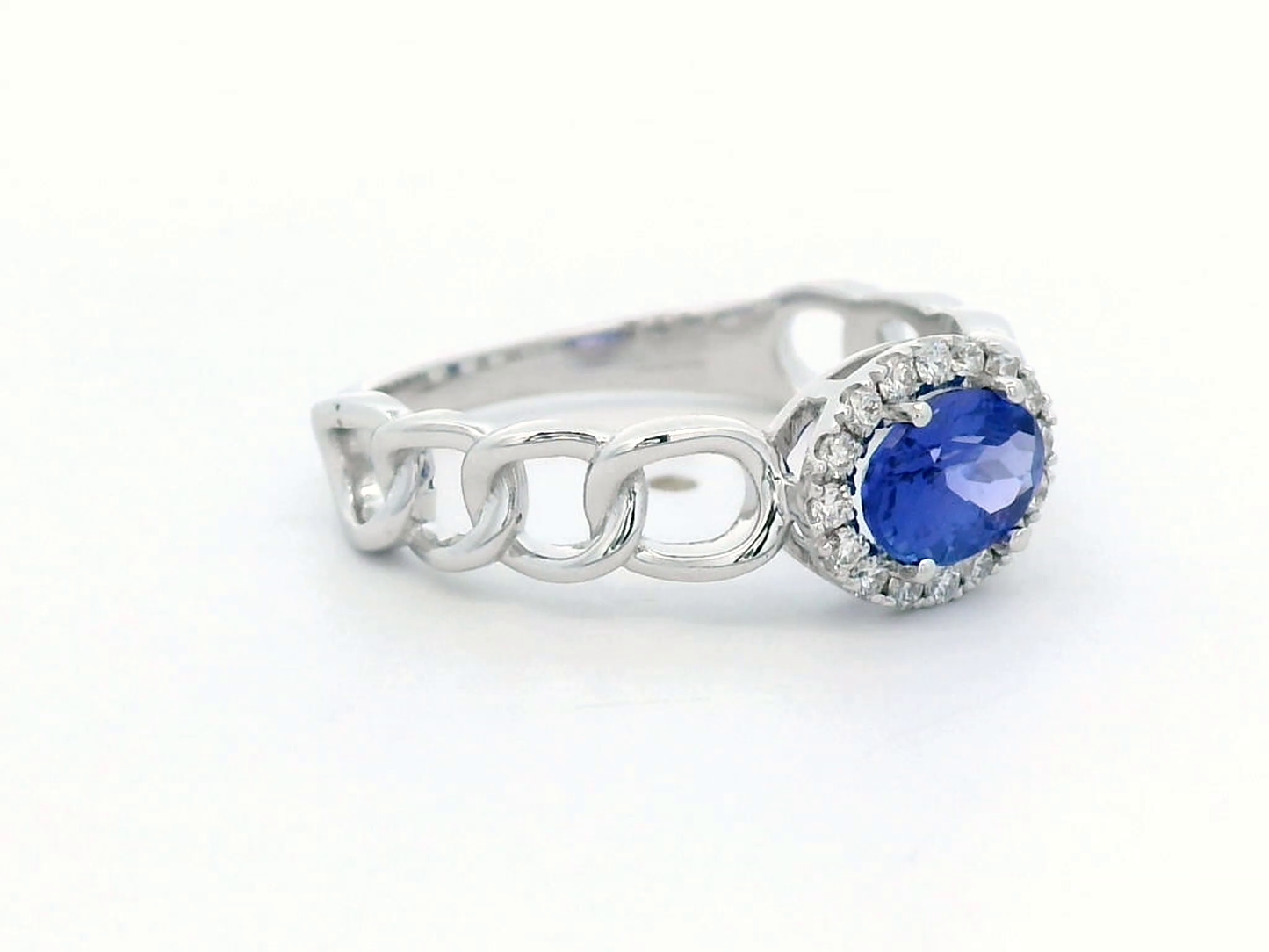 18K White Gold Oval Tanzanite and Diamond Halo Ring