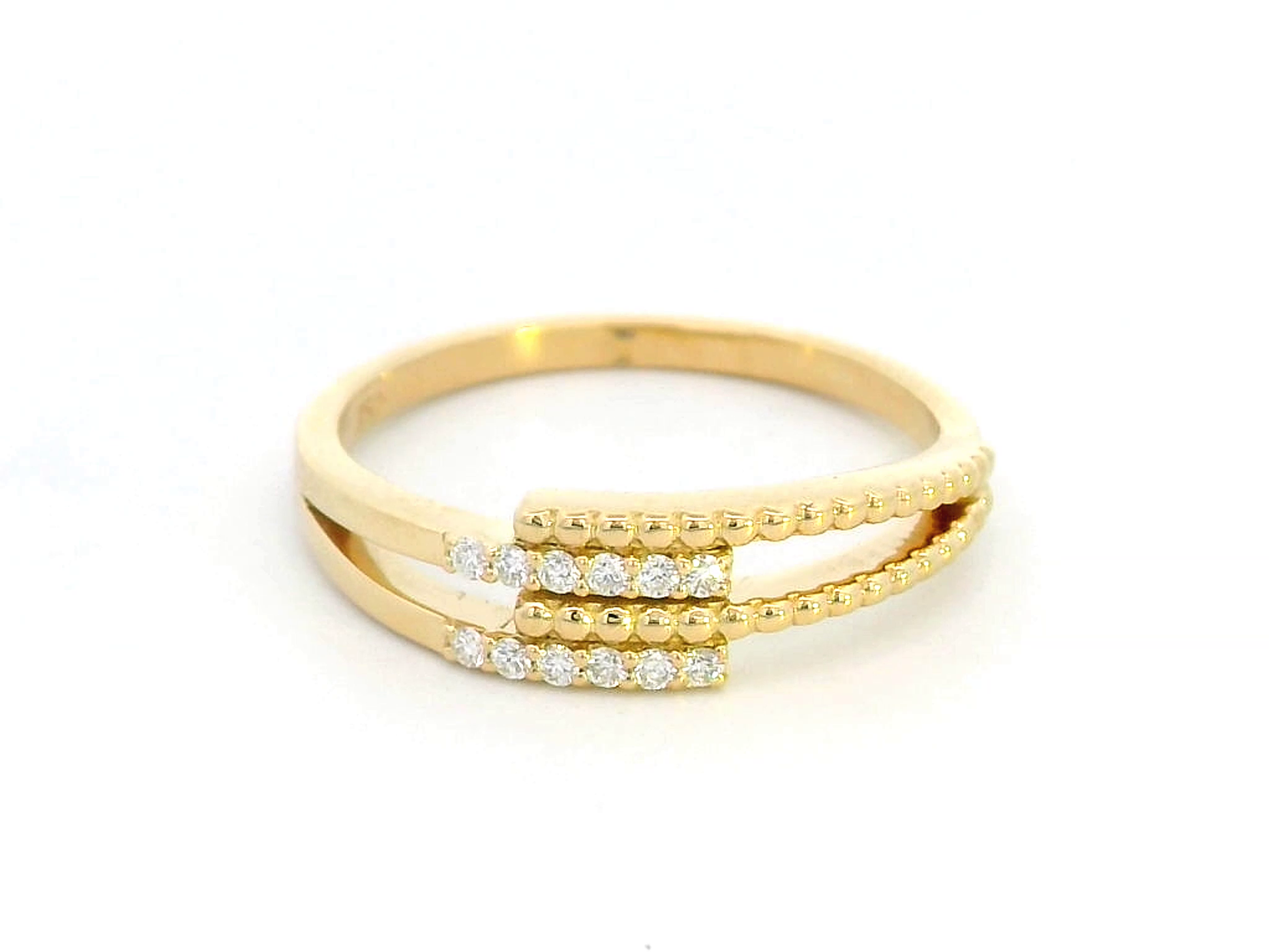 18K gold multi-band diamond ring featuring 0.08 carats of sparkling diamonds, a modern stacking-style design with polished and beaded gold details.