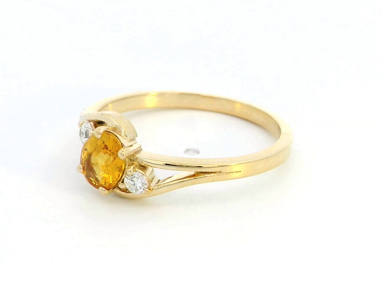 18K gold yellow sapphire and diamond ring with split shank design, featuring a 0.66-carat vibrant sapphire and 0.10-carat diamond accents – September birthstone jewelry