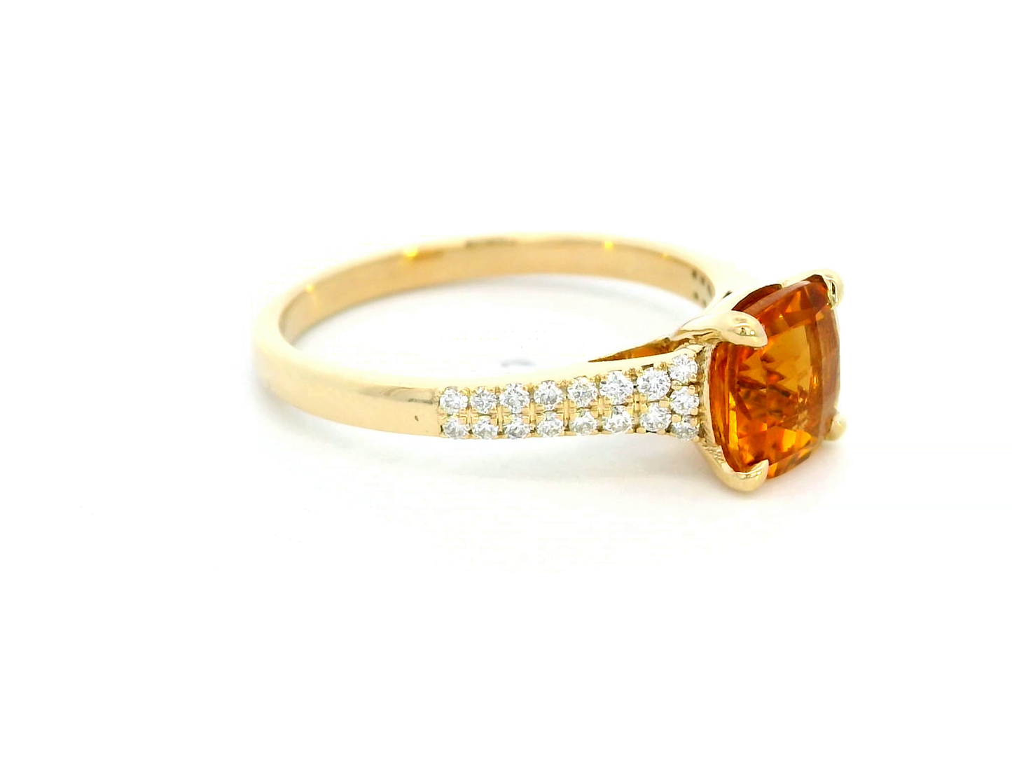 Luxury 18K gold cushion-cut citrine ring with a 1.30-carat natural citrine and 0.21-carat diamond-accented band in a four-prong setting.