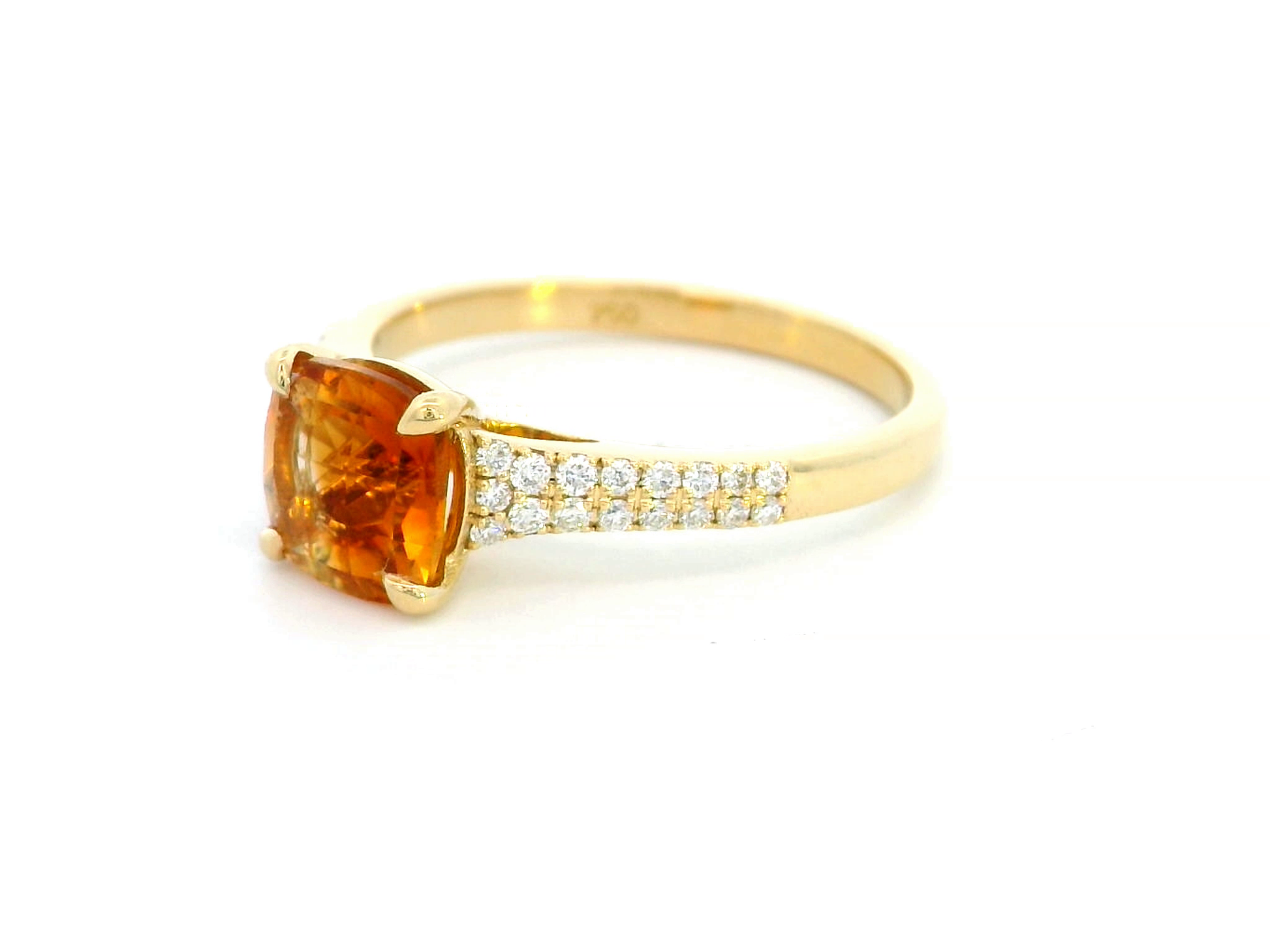 Luxury 18K gold cushion-cut citrine ring with a 1.30-carat natural citrine and 0.21-carat diamond-accented band in a four-prong setting.