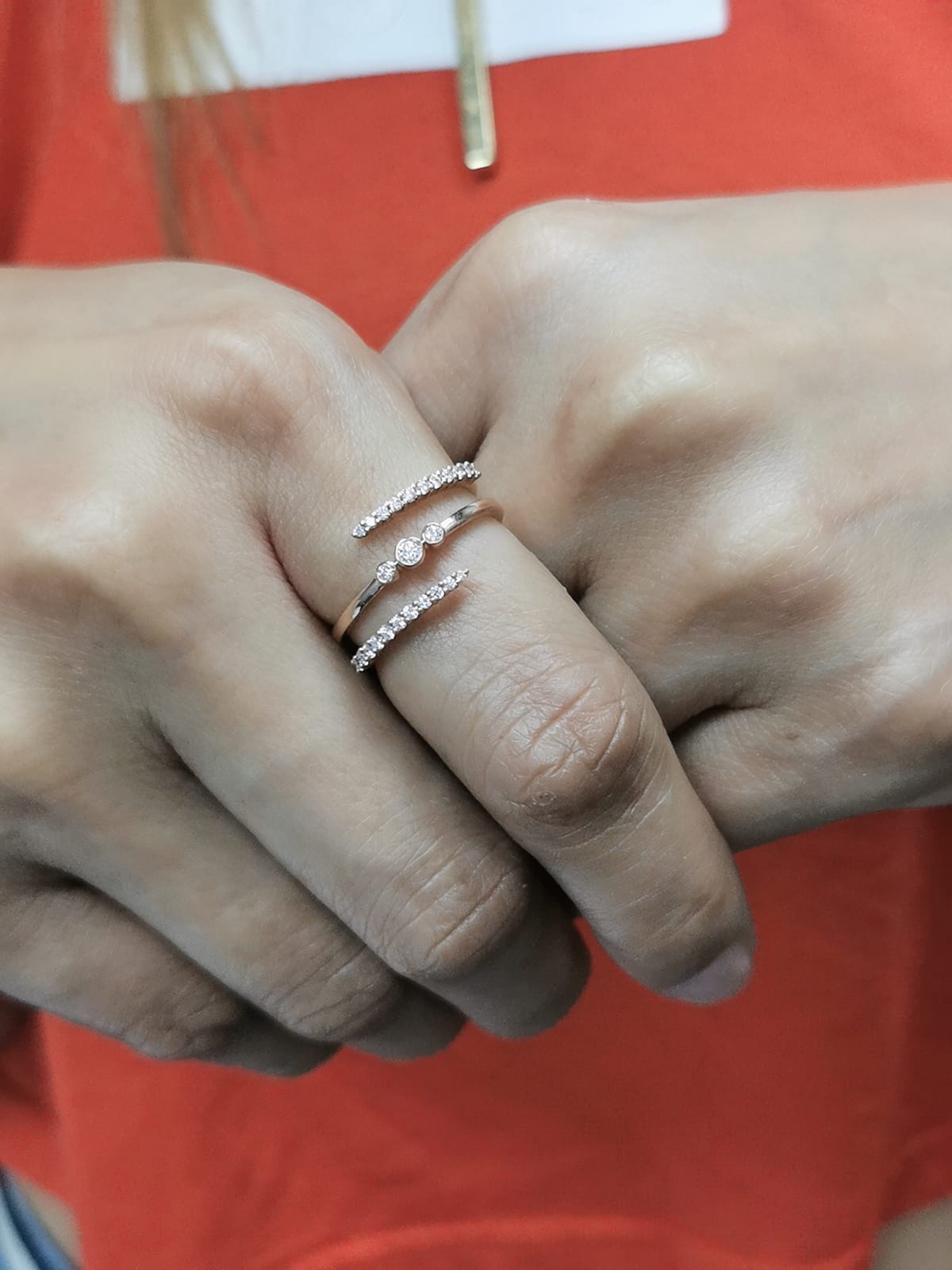 18K rose gold open wrap ring with 0.32 carats of round-cut diamonds in a modern spiral design – statement fine jewelry.