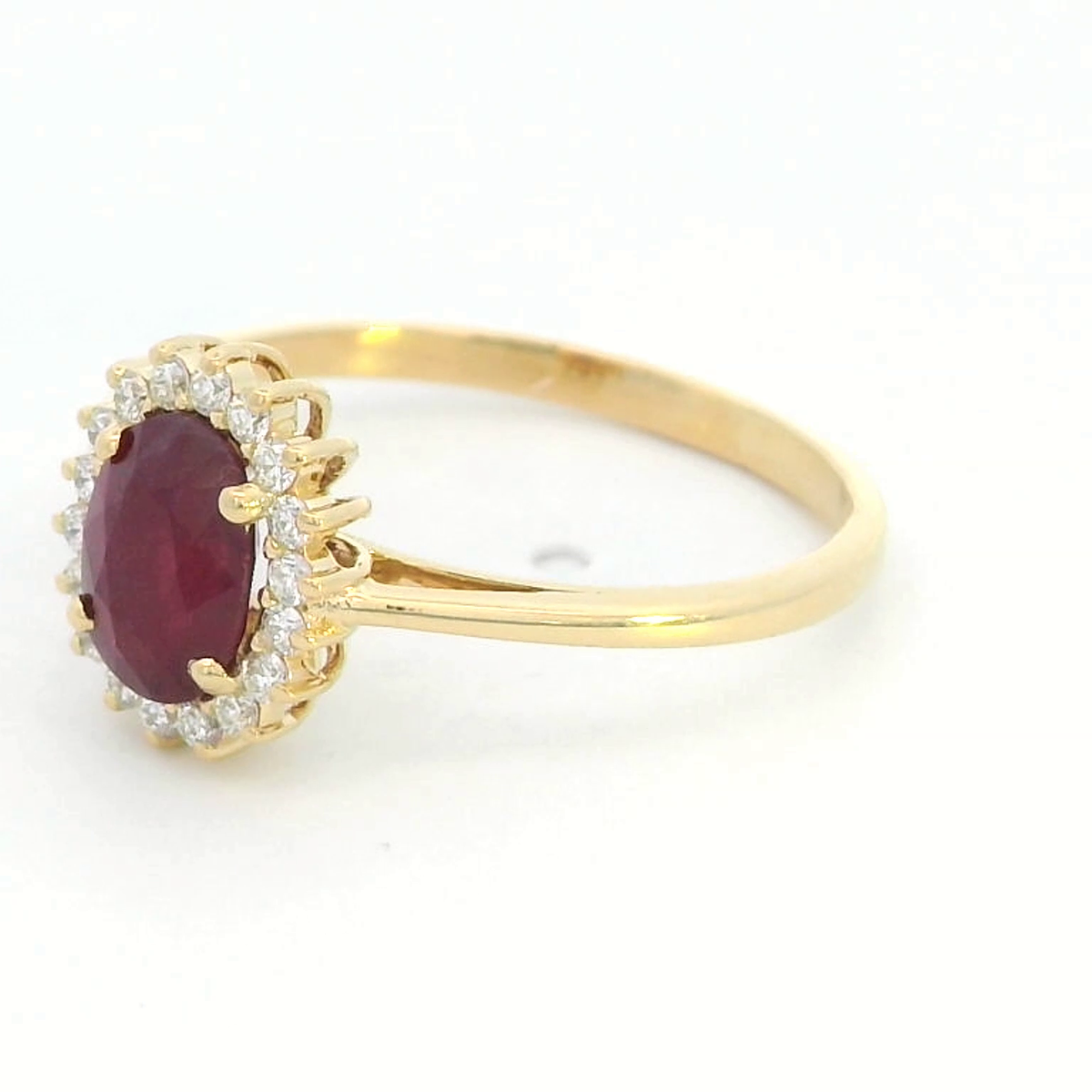 Timeless 18K Gold Ruby and Diamond Halo Ring (1.30ct Ruby | 0.15ct Diamonds)