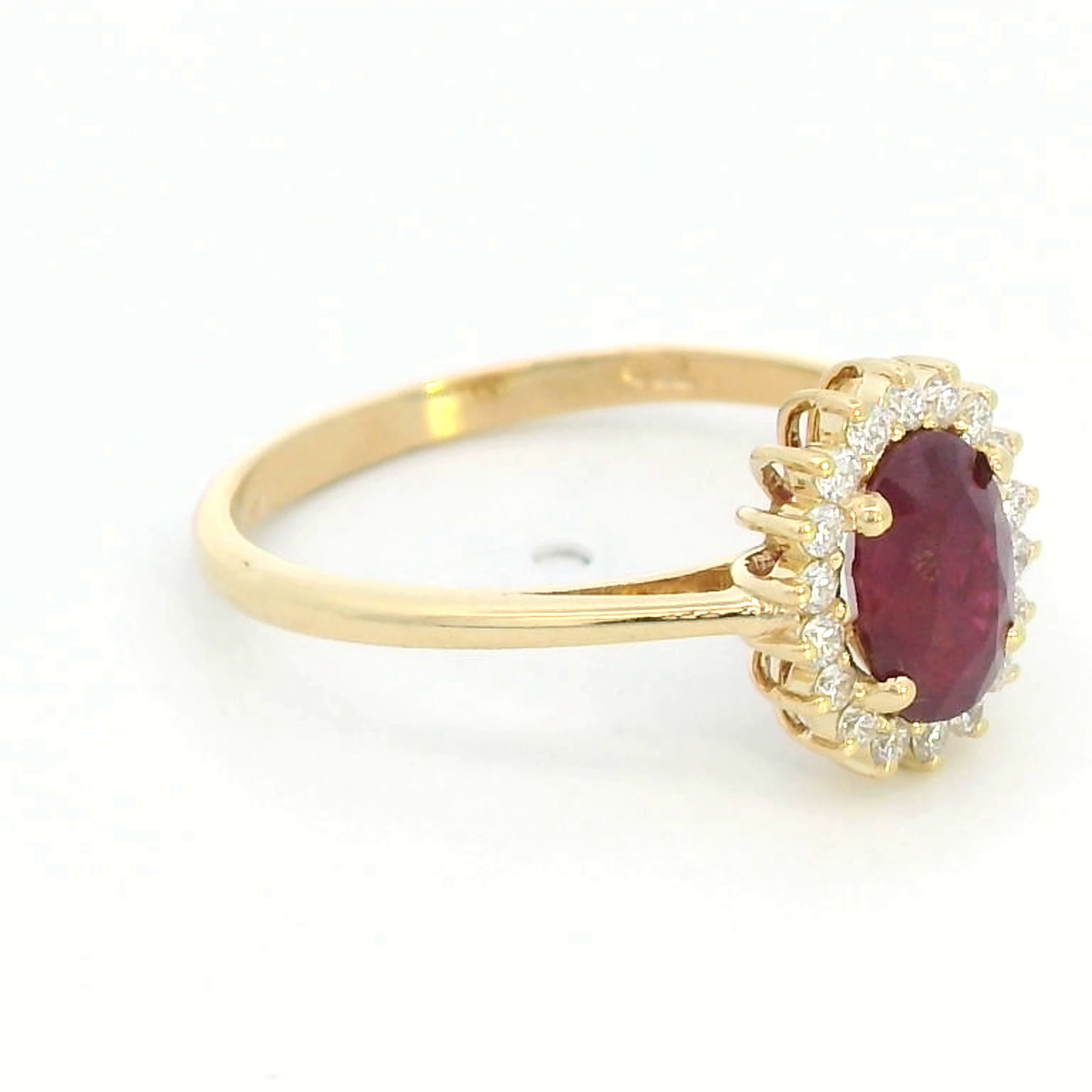 Timeless 18K Gold Ruby and Diamond Halo Ring (1.30ct Ruby | 0.15ct Diamonds)