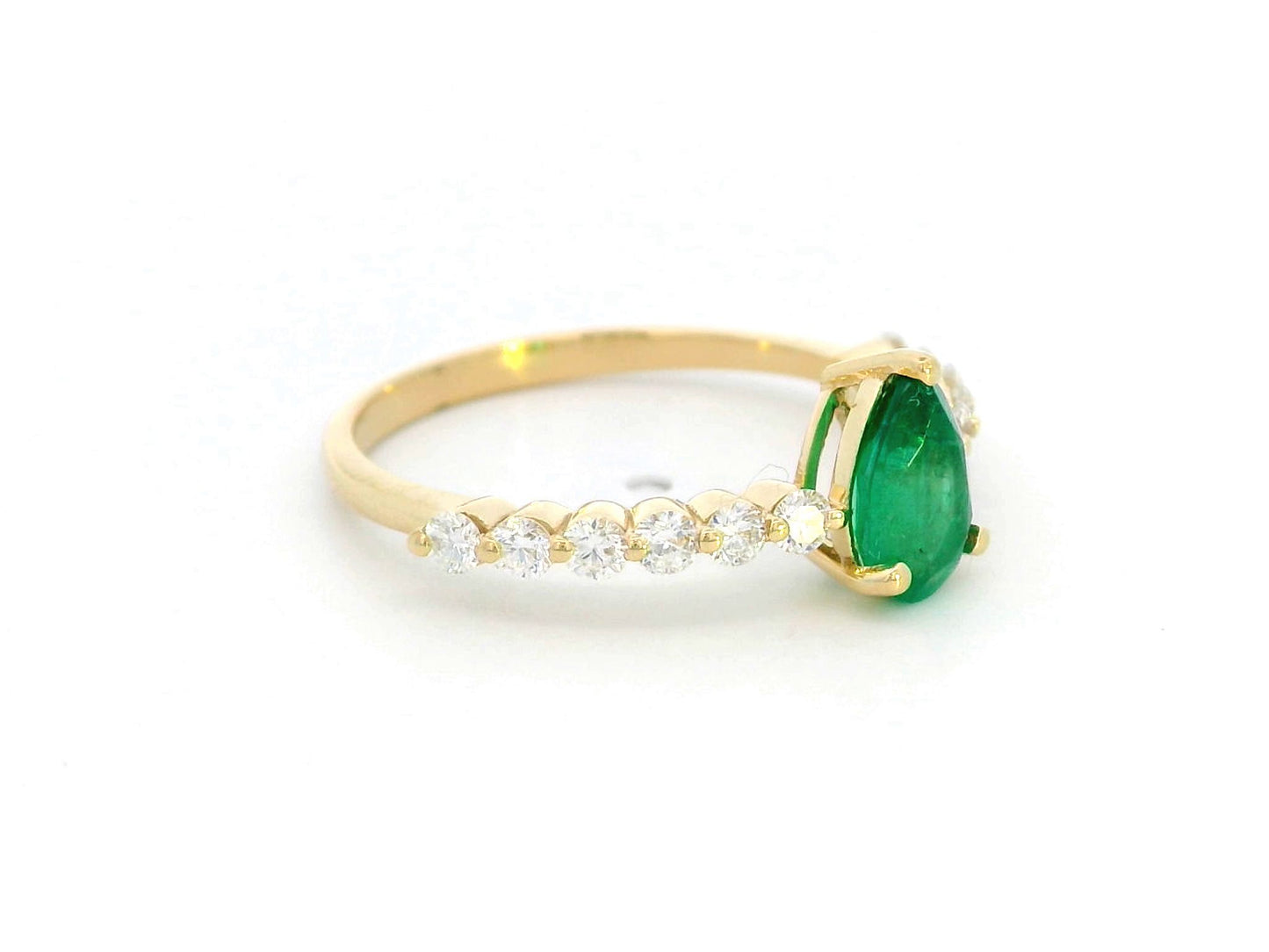 Luxurious 18K Gold Pear-Cut Emerald Ring with Diamonds on the band