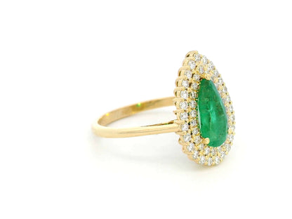 1.12 Carat Pear-Cut Emerald and 0.47 Carat Diamond Halo Ring in 18K Gold – Unique Engagement Ring