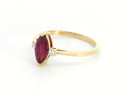 18K yellow gold ring with 0.97 carat marquise ruby and diamond accents"