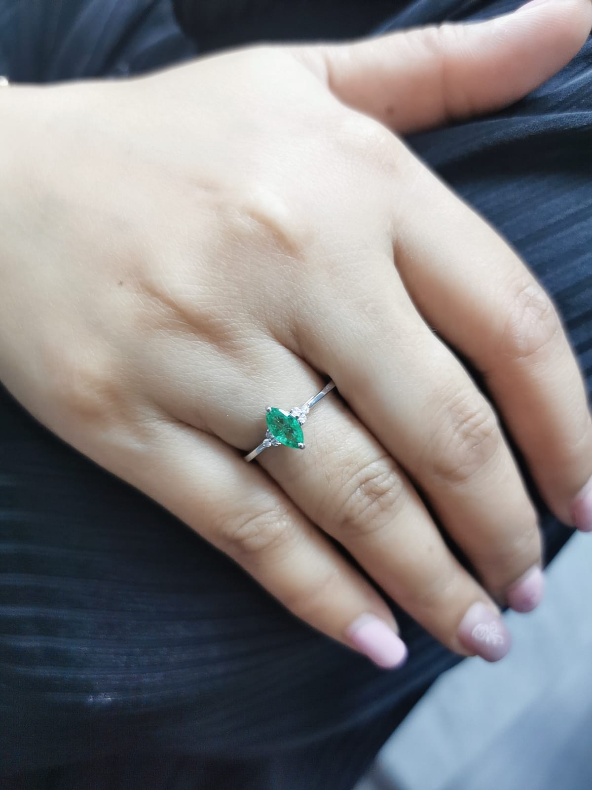 18K gold marquise emerald ring with diamond accents"