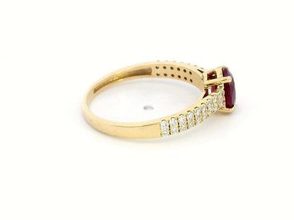 Shop this 18K gold ring featuring a 1.14-carat oval ruby and 0.33 carats of diamonds. Perfect for anniversaries, engagements, or as a stunning July birthstone gift."