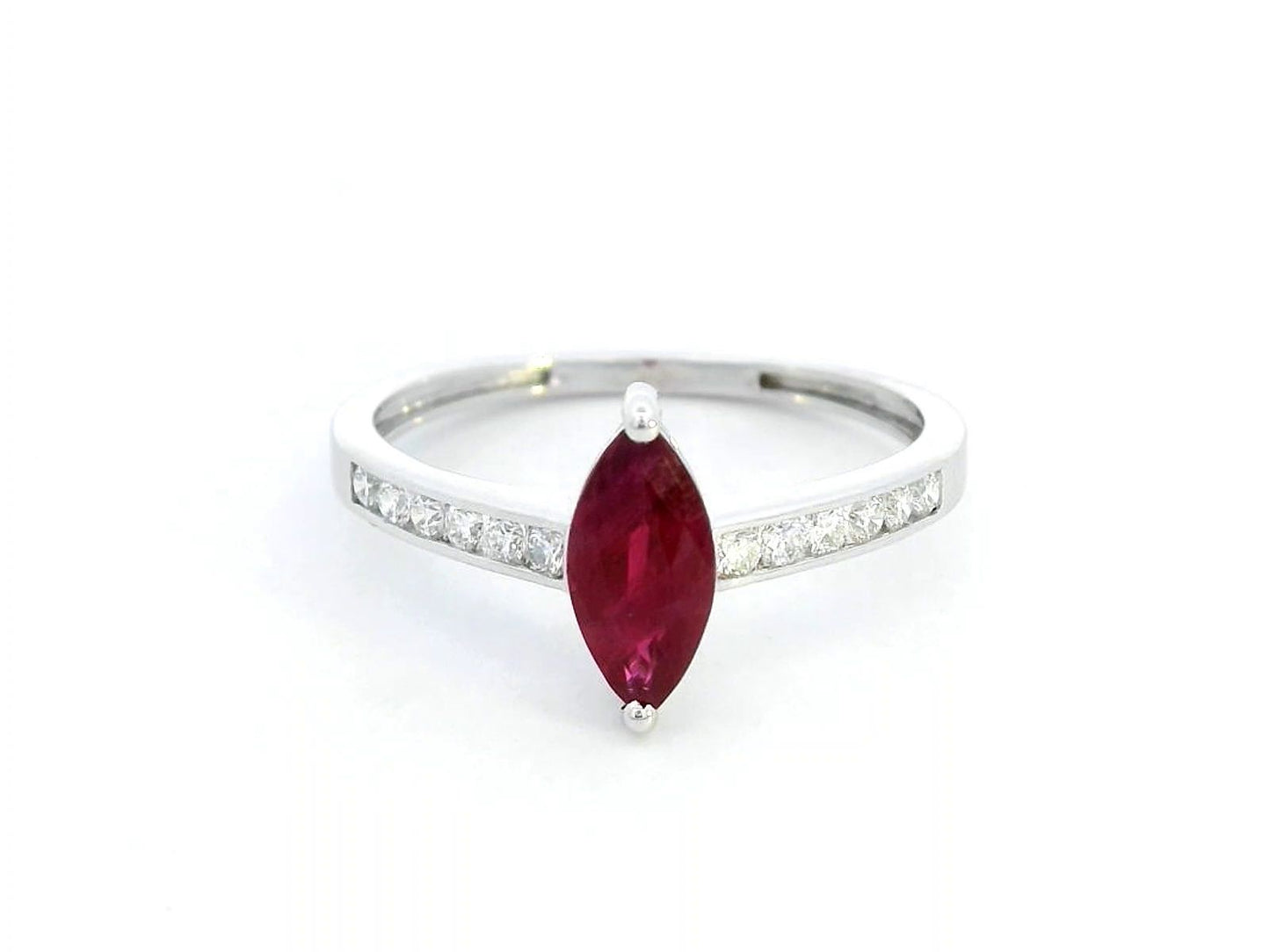  18K white gold marquise ruby and diamond ring featuring a 0.97-carat ruby and 0.21 carats of diamonds, symbolizing the July birthstone.