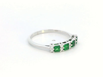 Princess-cut tsavorite and diamond ring in 18K white gold, elegant January birthstone jewelry.